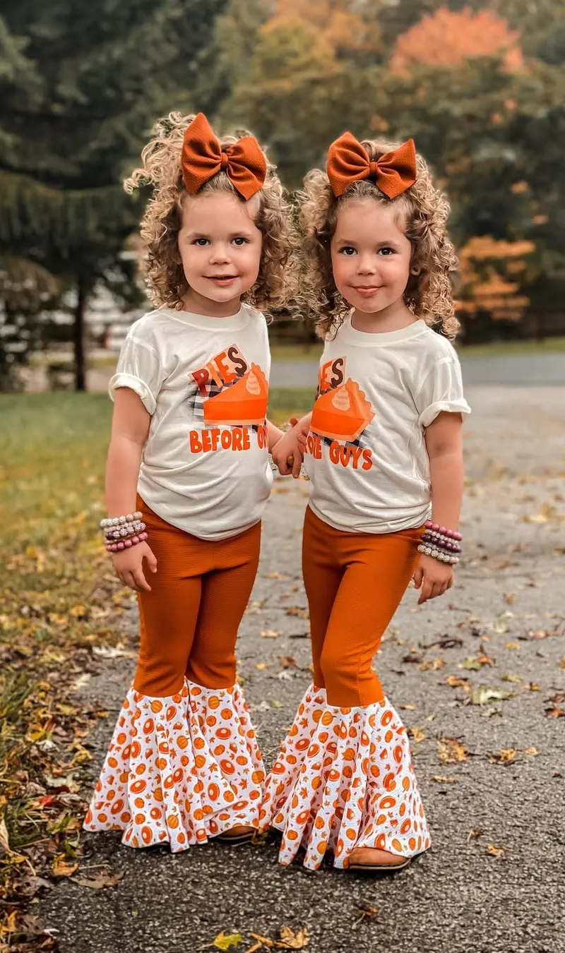 Adorable Twin Girls in Matching Pies Before Guys Outfits