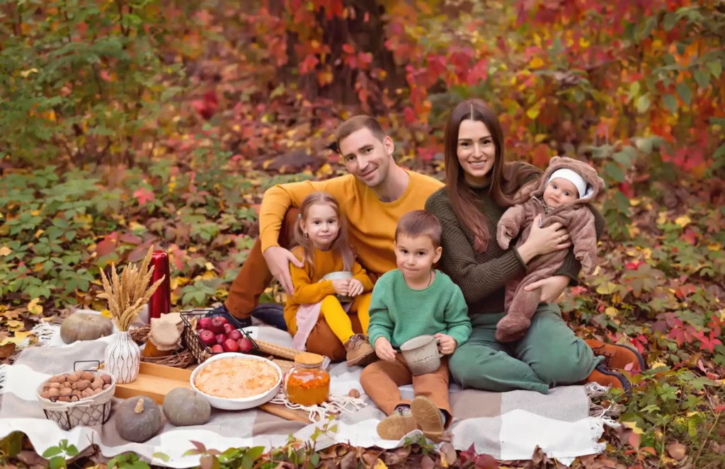 Autumn Family Picnic Session Among Colorful Foliage