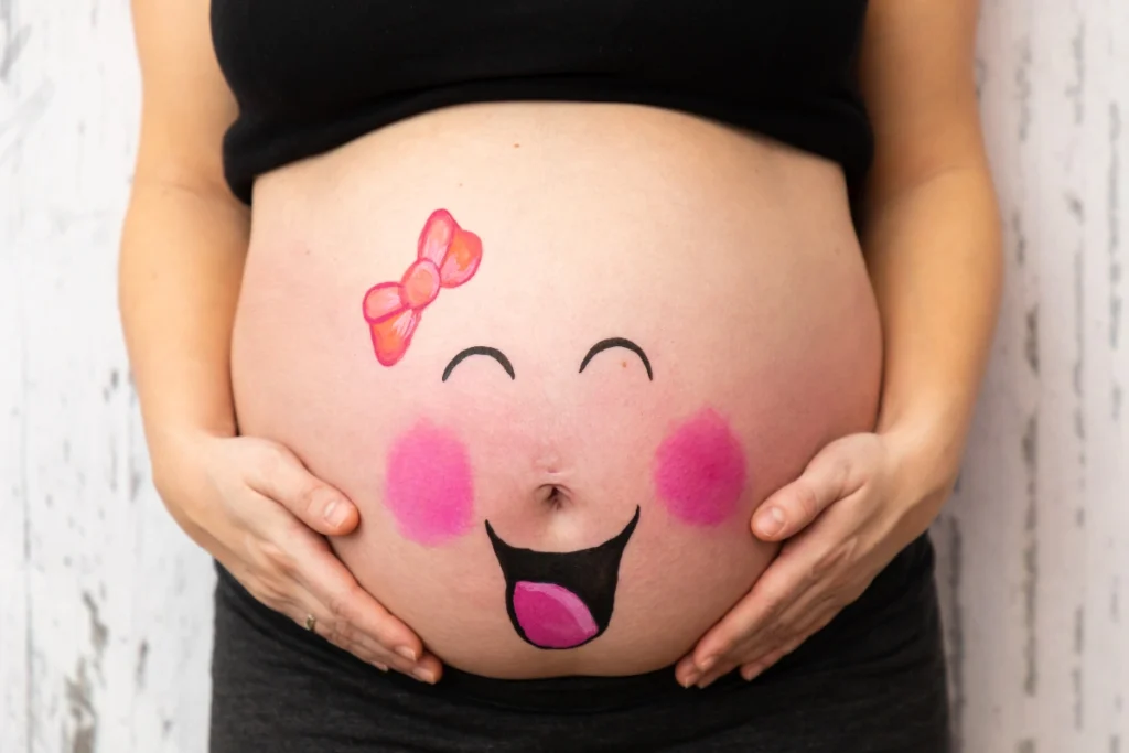 Baby Bump Smiley Face Paint