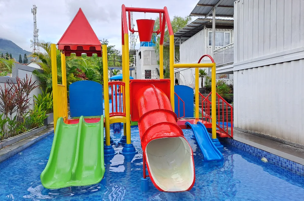 Backyard Mini Water Park with Colorful Slides