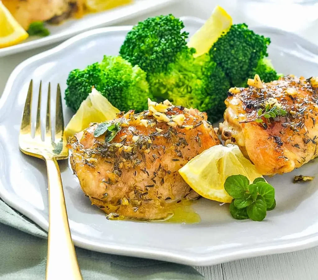 Baked Lemon Herb Chicken Thighs with Roasted Broccoli