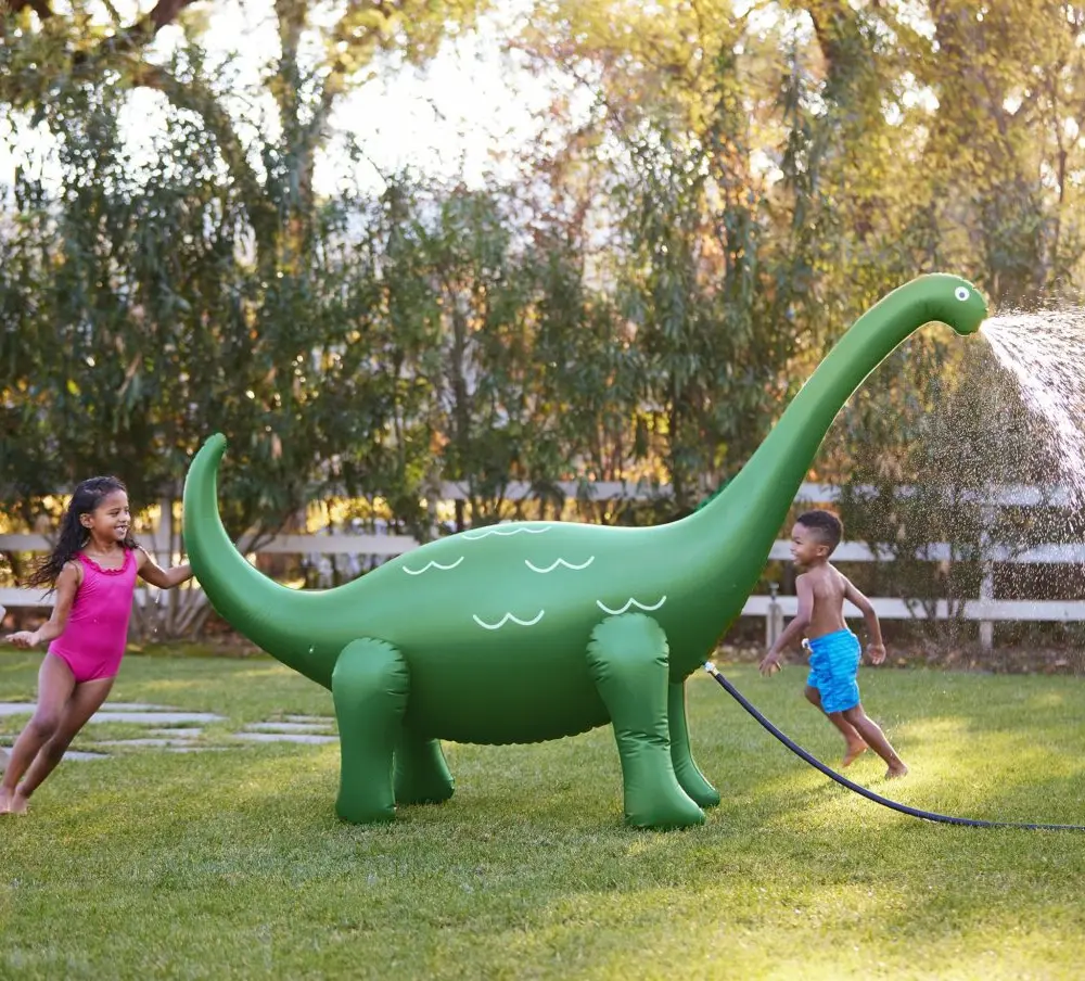 Dinosaur Sprinkler in Backyard