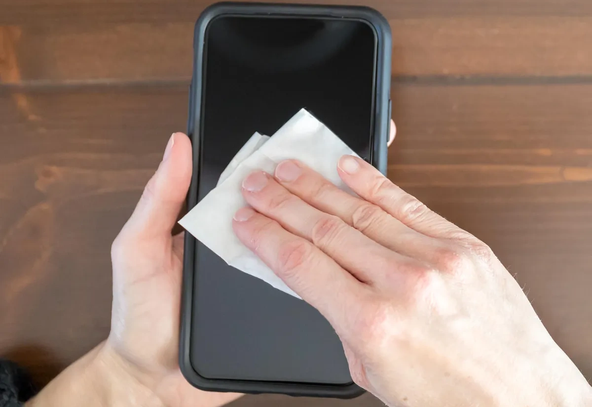You've Been Cleaning Your iPhone Screen Wrong This Whole Time (It's Causing Permanent Damage)