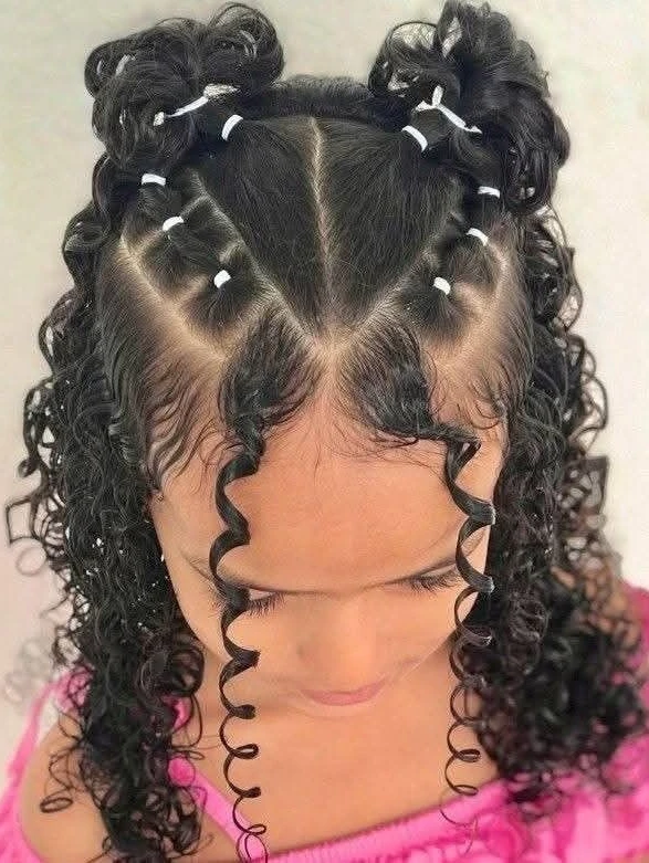 Curly Top Knots with Face-Framing Spirals