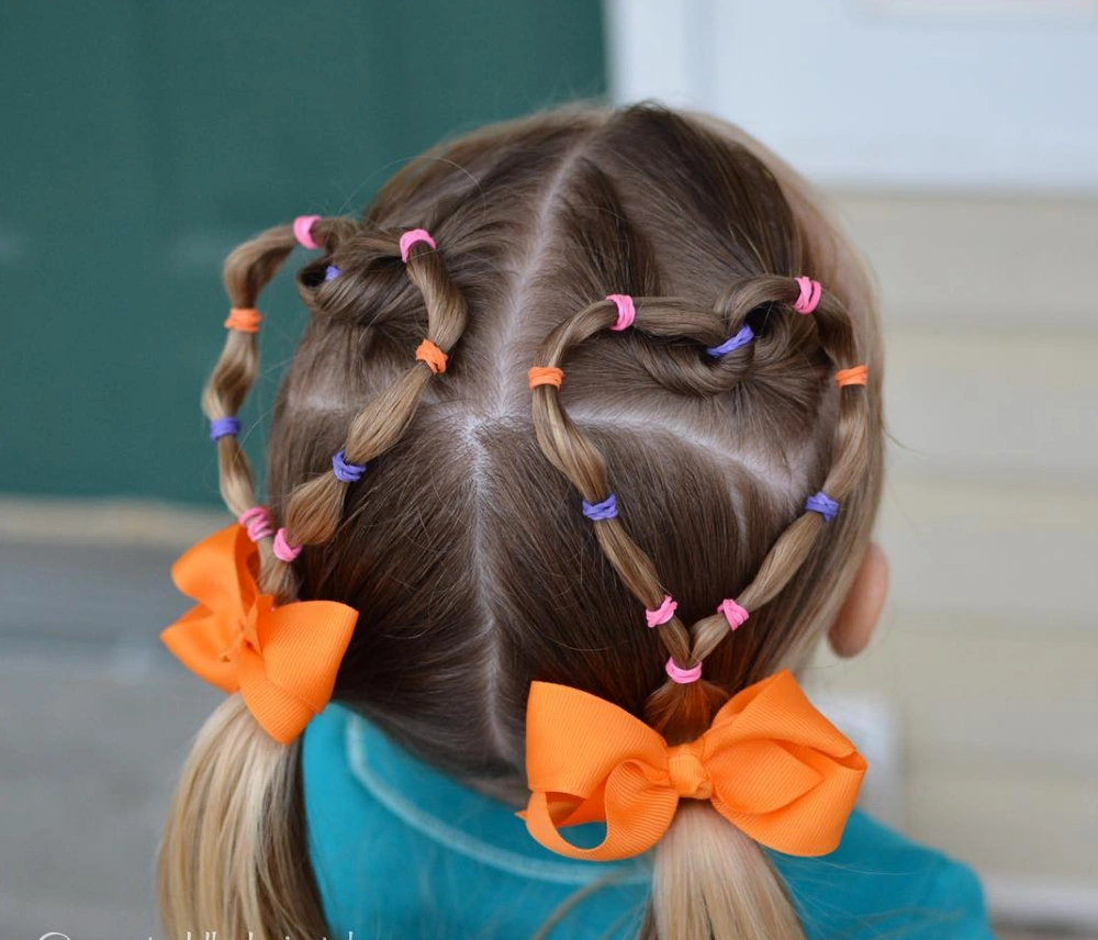 Double Heart Pigtails with Rainbow Elastics and Orange Bows
