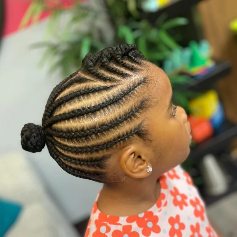 Elegant Side-Swept Cornrow Bun