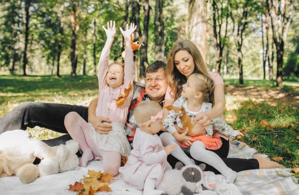 Joyful Leaf Tossing Family Picnic