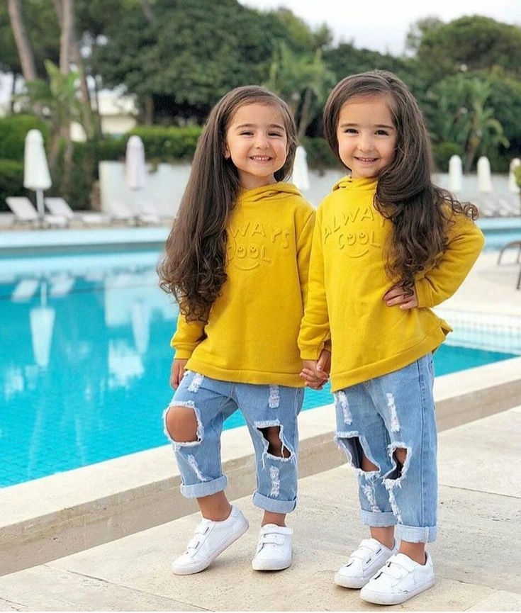 Matching Yellow Hoodies and Distressed Denim