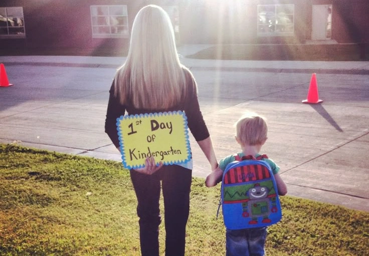 Mother and Child Holding Hands on First Day