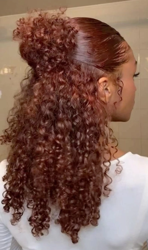 Sleek Auburn Curly Ponytail