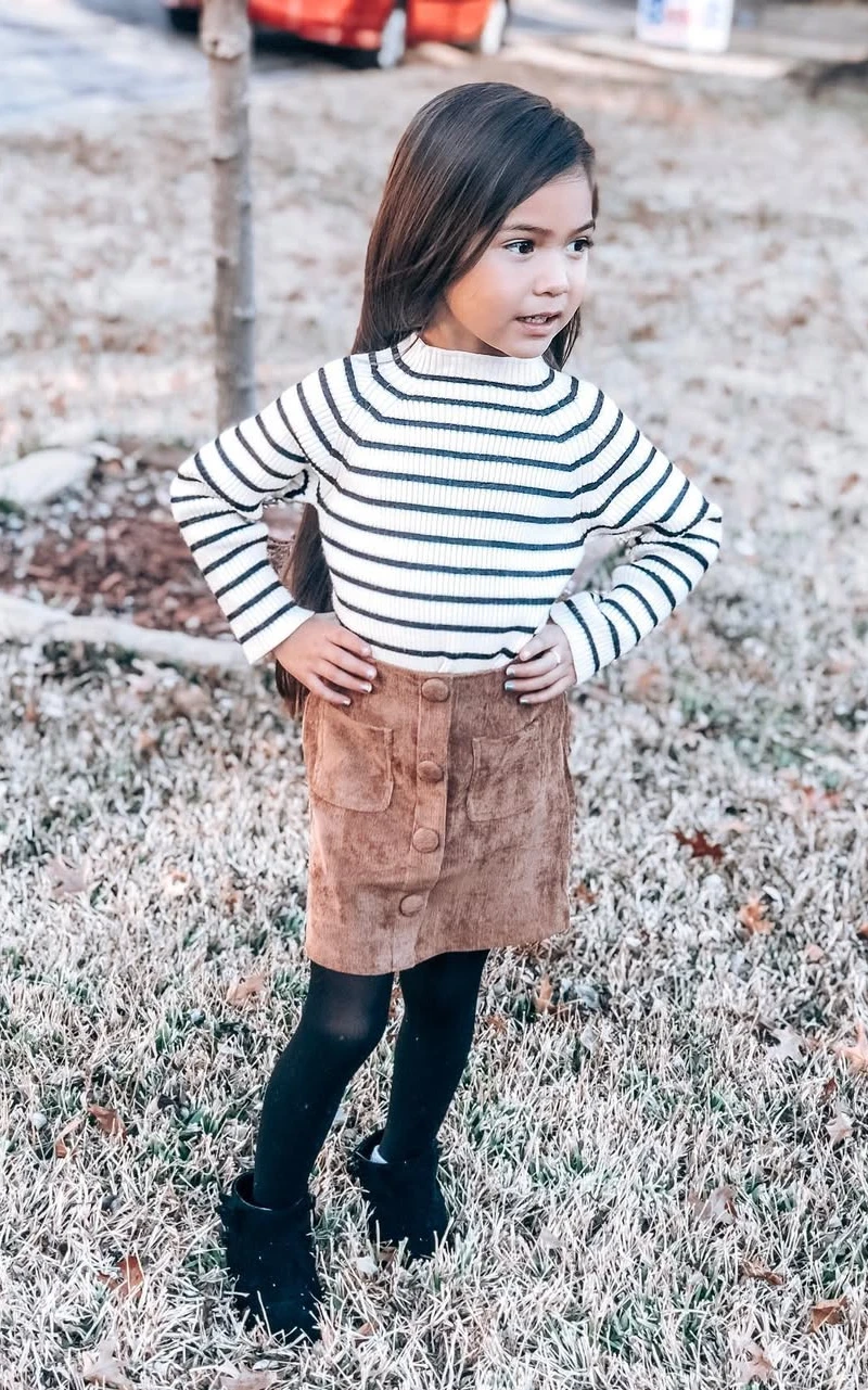 Stylish Girl in Classic Striped Sweater Look