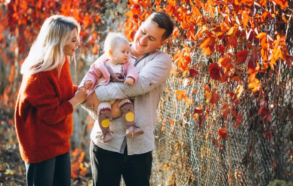 Vibrant Ivy Wall Fall Family Portrait with Baby